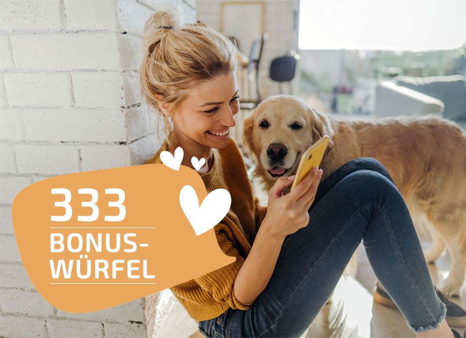 333 Bonuswürfel Frau kuschelt mit Hund 333 Bonuswürfel Frau kuschelt mit Hund